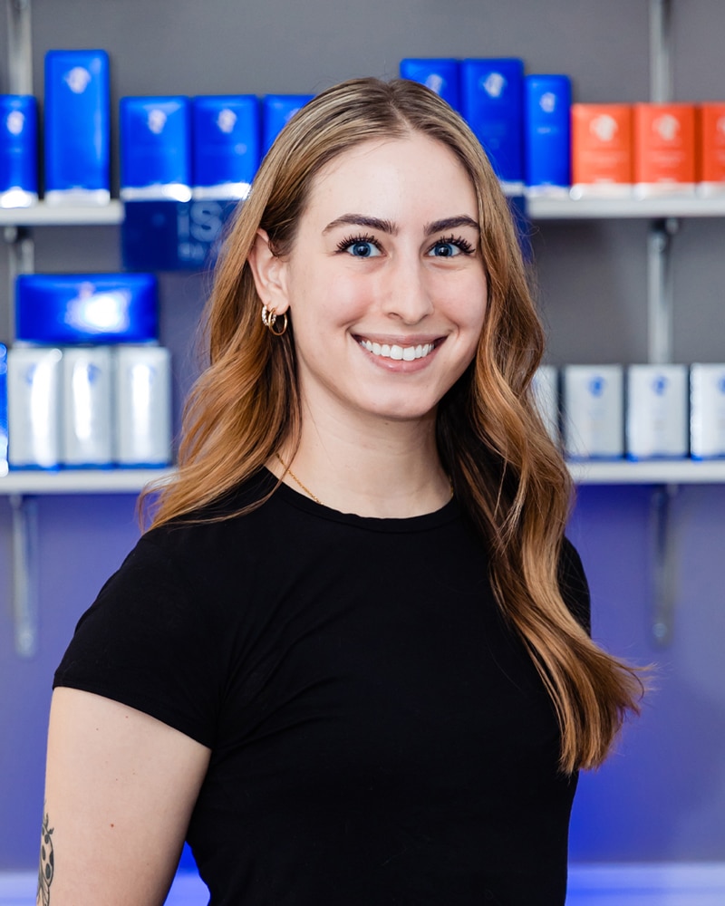 a person standing in front of a store