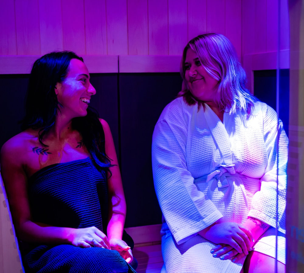 a couple of people that are sitting on a stage